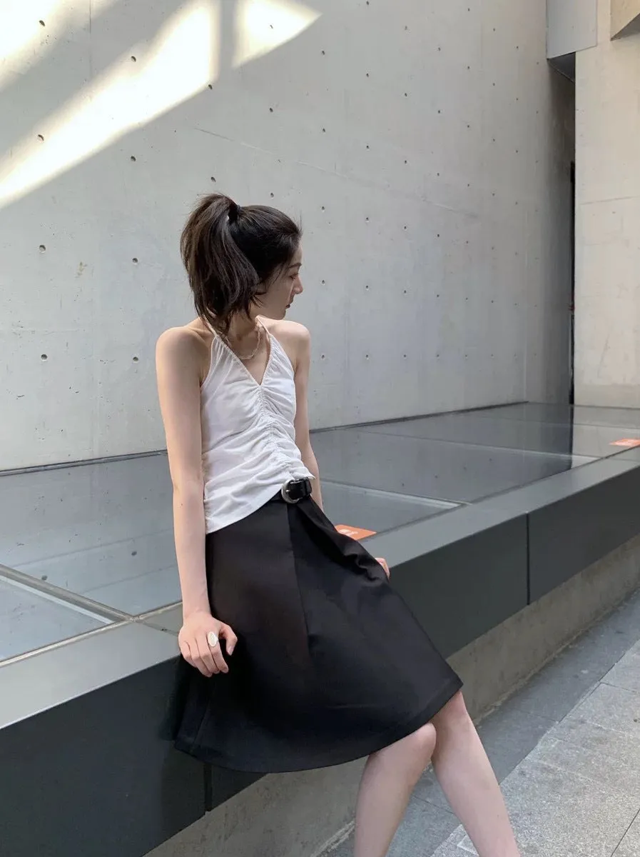 Pleated puffy black A-line skirt