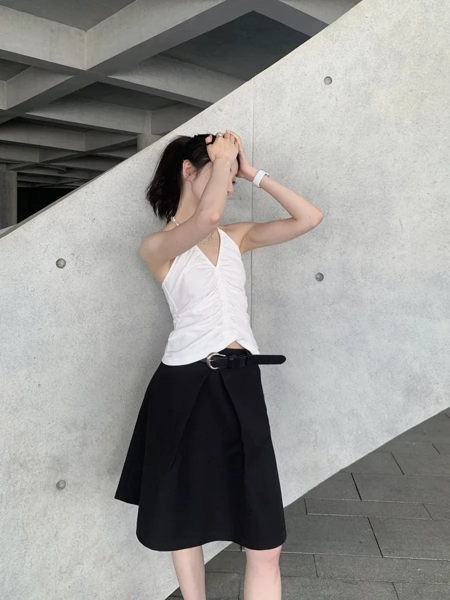 Pleated puffy black A-line skirt